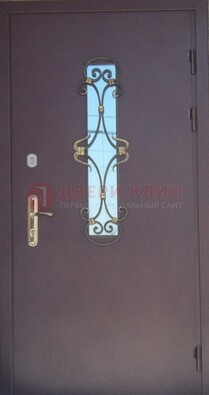 Металлическая дверь со стеклом и ковкой ДСК-77 в Саранске